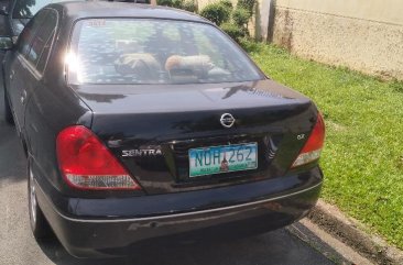 Black Nissan Sentra for sale in Esteban Abada 