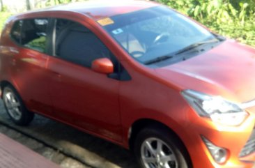 Selling Orange Toyota Wigo in Apalit