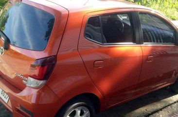 Selling Orange Toyota Wigo in Apalit