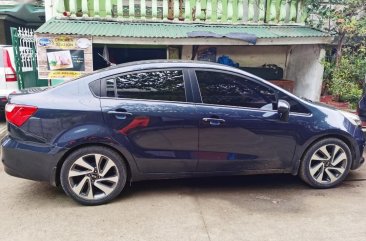 Sell Blue Kia Rio in Valenzuela