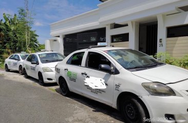 Selling White Toyota Vios in Quezon City