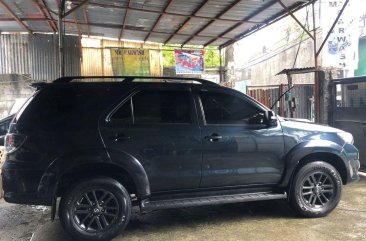 Selling Black Toyota Fortuner in Makati