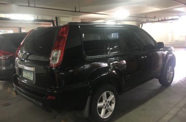 Selling Black Nissan X-Trail in Quezon City