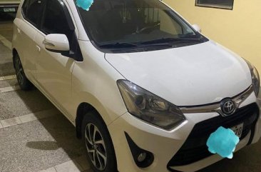 Pearl White Toyota Wigo for sale in Quezon 