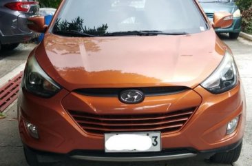 Sell Orange Hyundai Tucson in Manila