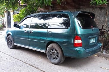 Blue Kia Carnival for sale in Las Piñas