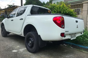 Sell Pearl White 2014 Mitsubishi Strada in Manila