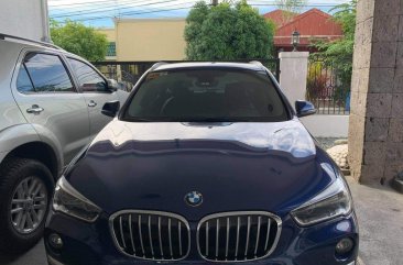 Selling Blue Bmw X1 in Parañaque