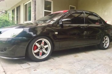 Black Mitsubishi Lancer 2005 for sale in Rizal