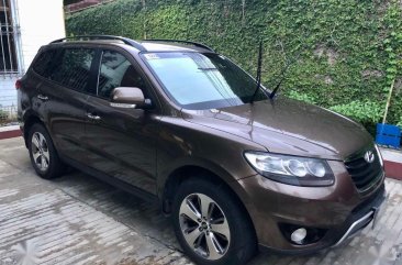 Brown Hyundai Santa Fe 2012 for sale in Manila