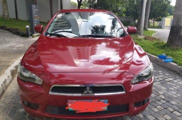 Red Mitsubishi Lancer 2013 for sale in Quezon City