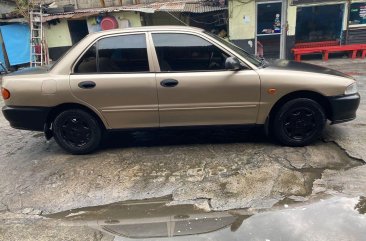 Golden Mitsubishi Lancer 1996 for sale in Caloocan