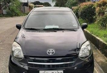 Selling Black Toyota Wigo 2016 in Calamba
