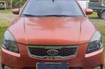 Orange Kia Rio 2015 for sale in San Pablo City