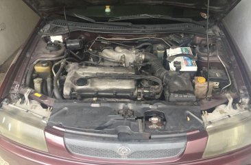 Selling Purple Mazda Familia 1998 in Quezon