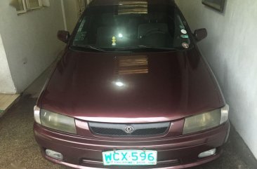 Selling Purple Mazda Familia 1998 in Quezon