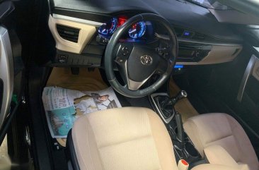 Selling Black Toyota Corolla Altis 2014 in Gapan