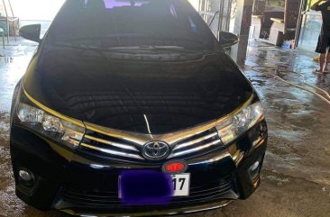 Selling Black Toyota Corolla Altis 2014 in Gapan