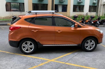 Orange Hyundai Tucson 2013 for sale in Cainta