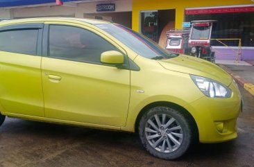 Selling Yellow Mitsubishi Mirage 2013 in Tabaco