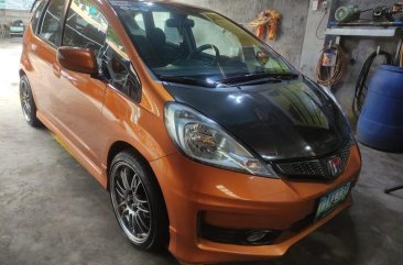 Selling Orange Honda Jazz 2012 in Valenzuela