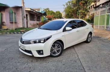 Selling White Toyota Corolla Altis 2016 in Caloocan