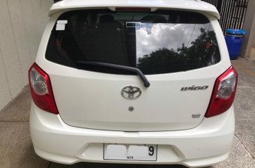 Pearl White Toyota Wigo 2015 for sale in San Mateo