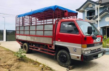 Sell Red 1992 Isuzu Elf in Balayan