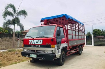 Sell Red 1992 Isuzu Elf in Balayan