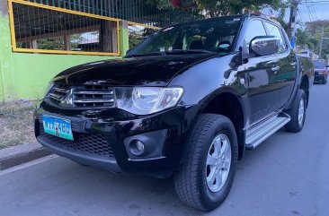 Sell Black 2013 Mitsubishi Strada in Manila