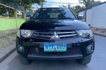 Sell Black 2013 Mitsubishi Strada in Manila