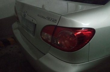 Selling Silver Toyota Corolla Altis 2004