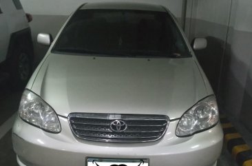 Selling Silver Toyota Corolla Altis 2004