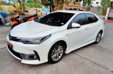 White Toyota Altis 2018