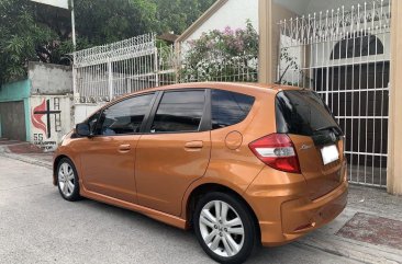 Orange Honda Jazz 2012 for sale in Manila