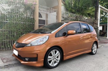 Orange Honda Jazz 2012 for sale in Manila