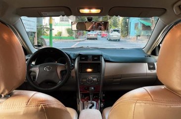 Pearl White Toyota Corolla Altis 2010 for sale in Quezon