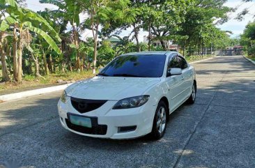 White Mazda 3 2008 