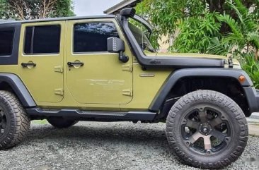 Selling Green Jeep Wrangler 2014 in Antipolo