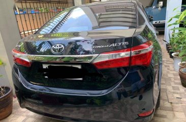 Selling Black Toyota Corolla Altis 2014 in Marikina