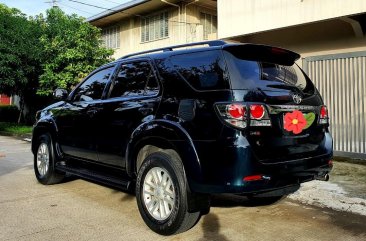 Selling Black Toyota Fortuner 2013 in Parañaque