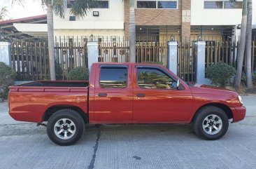 Red Nissan Frontier 2000 for sale in Manila