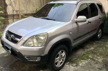 Brightsilver Honda CR-V 2004 for sale in Quezon