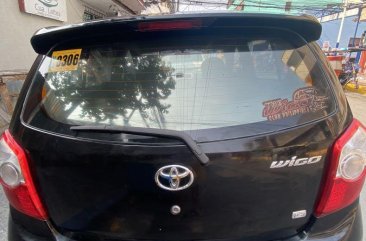 Selling Black Toyota Wigo 2016 in San Juan