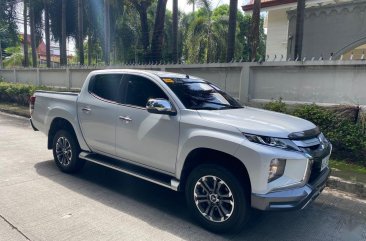 Selling Pearl White Mitsubishi Strada 2019 in Pasig