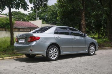 Brightsilver Toyota Corolla Altis 2010 for sale in Quezon