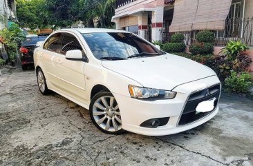 Selling Pearl White Mitsubishi Lancer 2010 in Quezon City