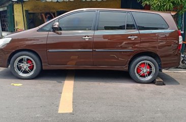 Brown Toyota Innova 2013 for sale in Quezon City