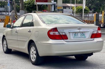 Selling Brightsilver Toyota Camry 2002 in Makati