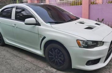 Pearl White Mitsubishi Lancer 2010 for sale in Quezon City